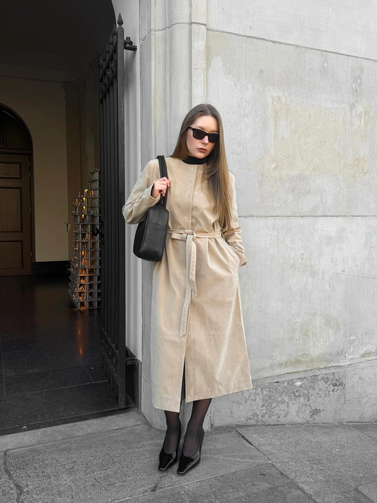 A Beige Belted Dress with Black Accessories for Minimal Elegance
